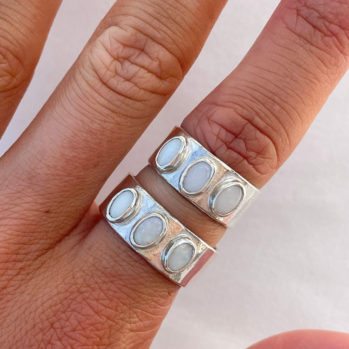 white opal trio rings